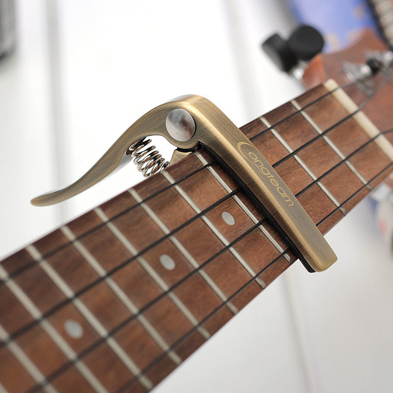 Capo för ukulele