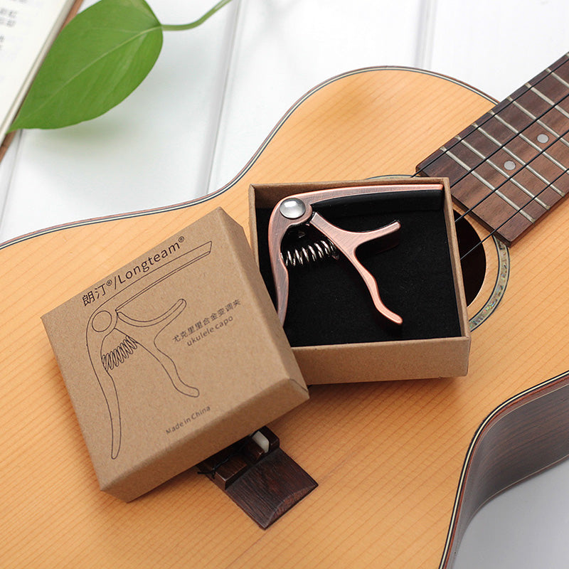 Capo för ukulele
