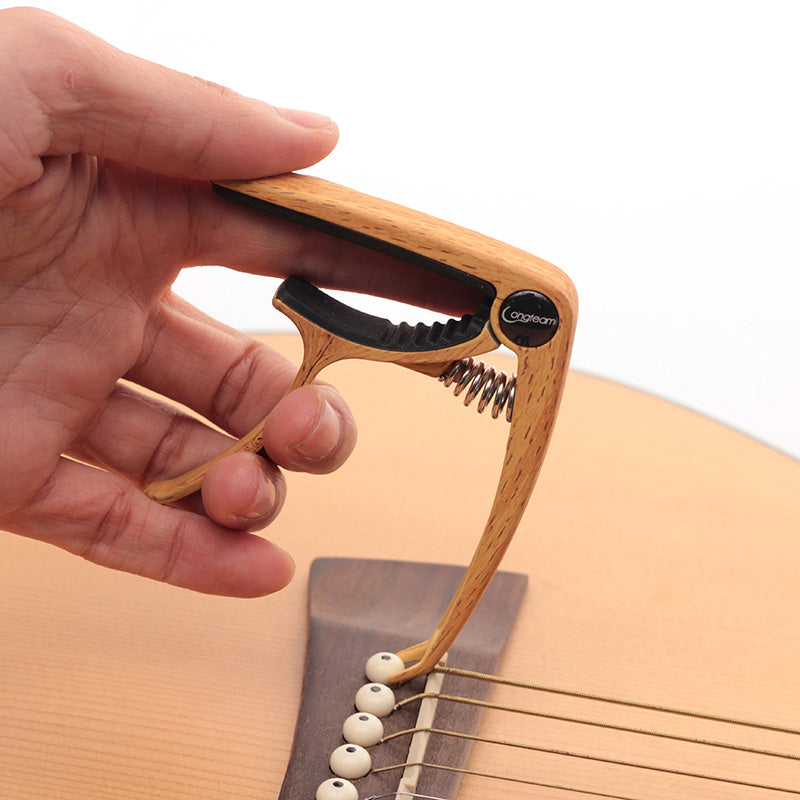 Capo för ukulele/gitarr