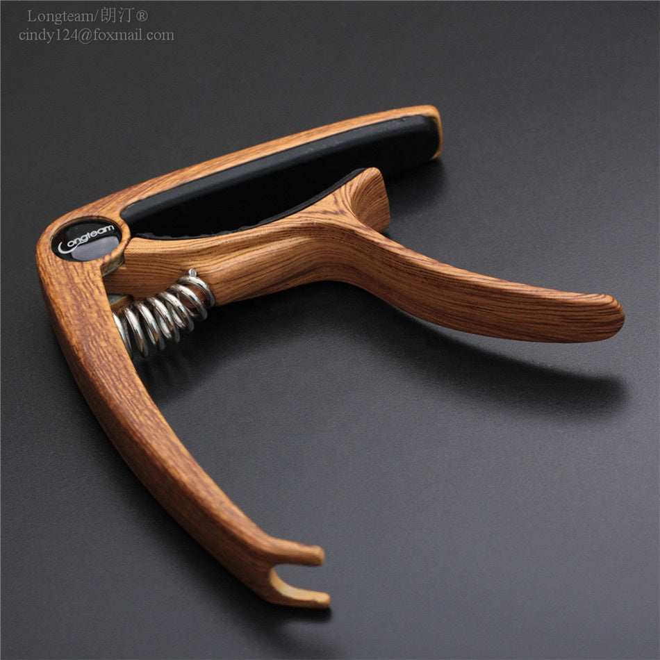 Capo för ukulele/gitarr