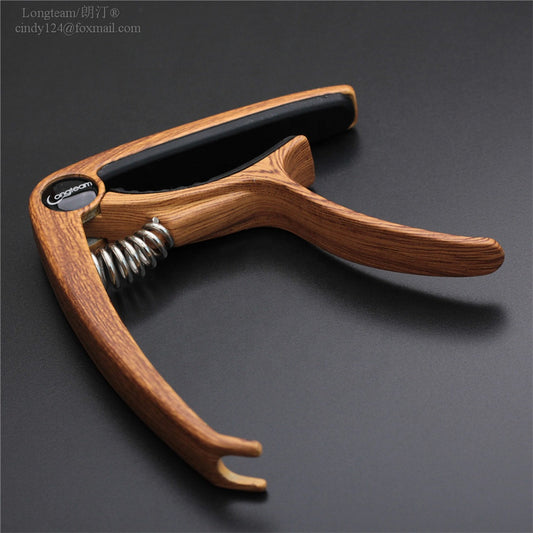 Capo för ukulele/gitarr