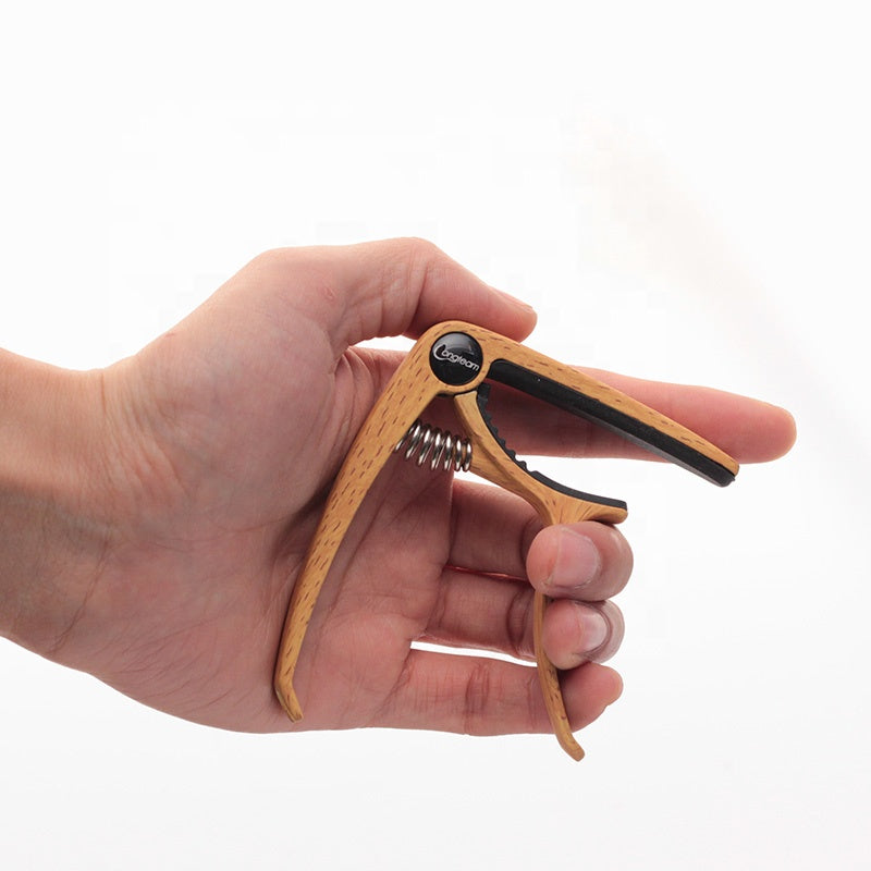Capo för ukulele/gitarr