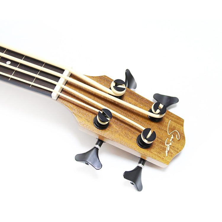 Ukulelebas med topp i gran