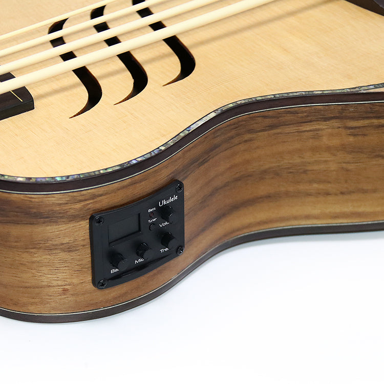 Ukulelebas med topp i gran